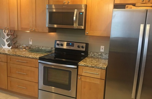 Lagoon Heights House | Relax & Renew at Luxury Villa with Heated Pool & Hot Tub,Tennis,Bikes,Firepit!