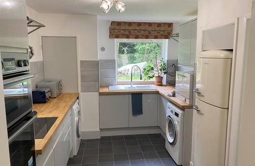 Wickham House | Relax surrounded by woodland in the Annex at Capers End!