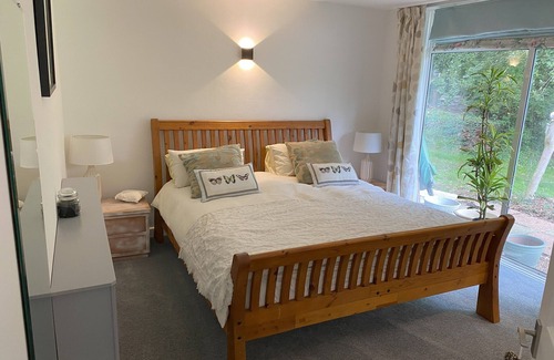 Wickham House | Relax surrounded by woodland in the Annex at Capers End!