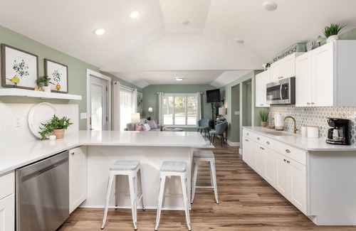 Harrison Cottage | Relax & Unwind at Anna's Place! Stylish interior, gardens + a beautiful patio.