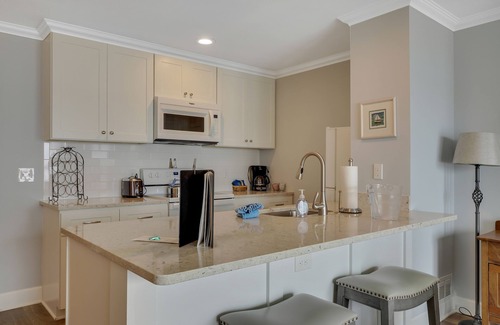 Boyne City Condo | Relax & Unwind | Lake Charlevoix Views | Private Patio + Beach | Fireplace |