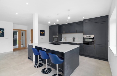 Cambridge House | Relax with easy access to Cambridge. Electric car charging and parking available