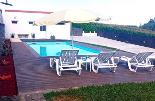 Nordeste Cottage | Relax with the family, enjoying the garden ,pool as well as the sea views.n