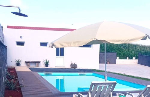 Nordeste Cottage | Relax with the family, enjoying the garden ,pool as well as the sea views.n