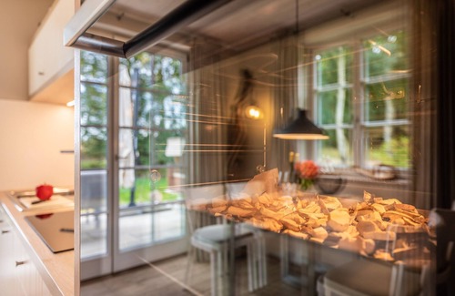 Putbus House | Relaxation by the water: Holiday home Herrlichkeit 1 in the Klein Stresow vacation village