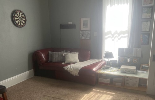 Chanute Bed & Breakfast | Relaxation Destination: A whole floor and game room to yourself