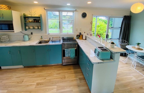 Waikouaiti House | Relaxing cosy 1950's family beach house 1 block back from the beautiful beach.