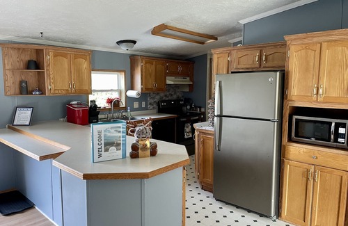 Upper Peninsula House | Relaxing getaway with fenced in yard & hot tub!