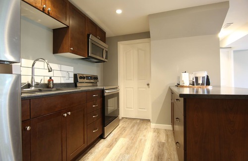 East Hill House | Relaxing guest suite with private patio and beautiful view!