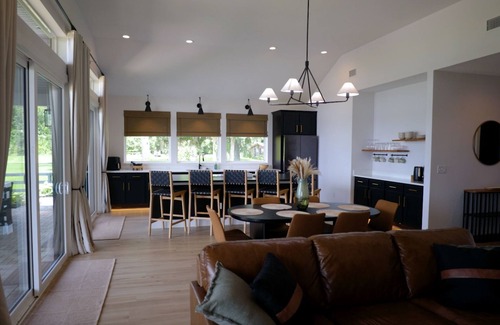 Interlachen House | Relaxing Lakefront Escape with Hot Tub, Fire Pit, Kayaks & Paddle Boards