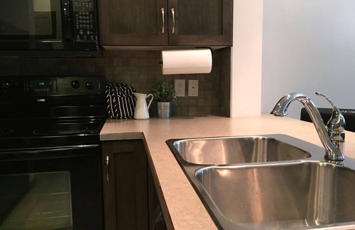 South Pandosy Condo | Relaxing Retreat Overlooking Playa's Quiet 3rd Floor Courtyard