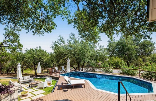 Barton Bend House | Remarkable villa with private pool, patio, game room, fireplace & gorgeous views