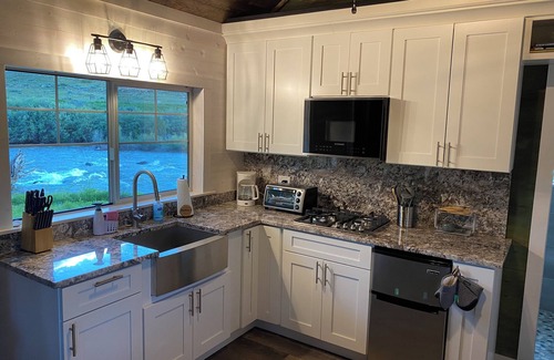 Dubois Cabin | Remodeled Cabin on 40 private acres of Wind River frontage with R/V hookup.n