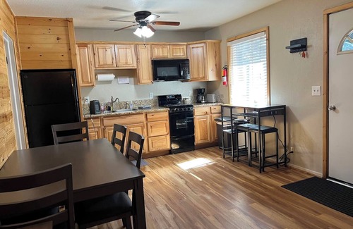 Peninsula Village Cabin | Remodeled cozy 2-bedroom cabin, pet friendly, free boat launch & slip, lakeside