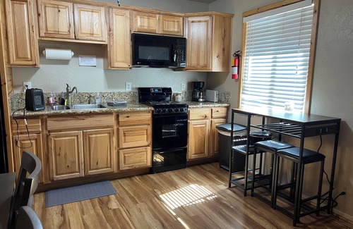 Peninsula Village Cabin | Remodeled cozy 2-bedroom cabin, pet friendly, free boat launch & slip, lakeside