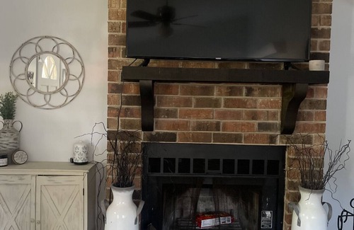 Alexandria House | Remodeled duplex with fireplace and patio