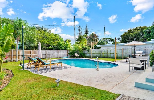 Mango Groves House | Remodeled historic boho-bungalow w/private pool at Lake Worth Beach.
