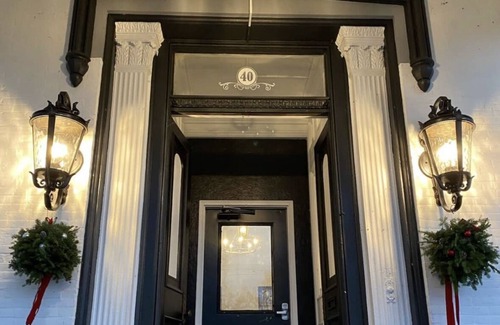 Oswego Apartment | Remodeled Historical Mansion Minutes from Oswego’s Best!