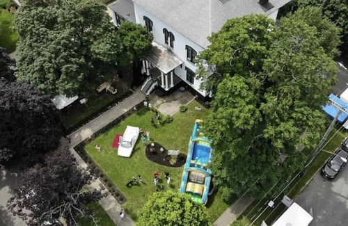 Oswego Apartment | Remodeled Historical Mansion Minutes from Oswego’s Best!