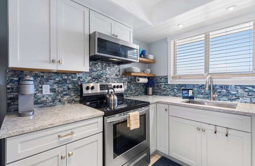 New Smyrna Beach Condo | Remodeled Oceanfront Condo - Balcony, Beach, Pool