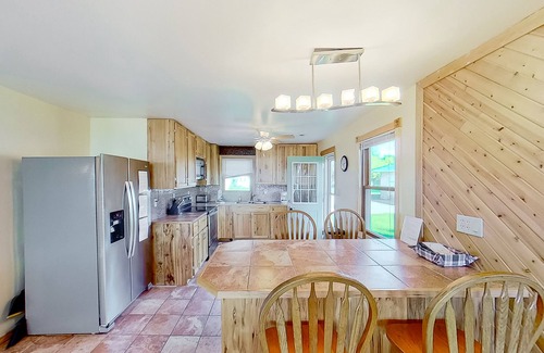 Onekama House | Remodeled, waterfront home on Portage Lake with dock & firepit - 2 dogs OK