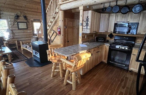 Champion Cabin | Remote log lodge in the Huron Mountain foothills.
