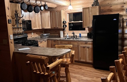 Champion Cabin | Remote log lodge in the Huron Mountain foothills.