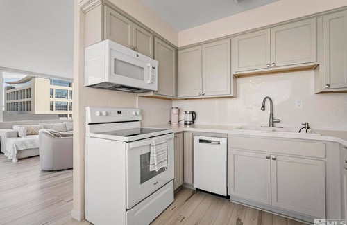 Downtown Reno Apartment | Reno 1 Bedroom, corner view condo, on the Truckee River Walk, bike, theater.