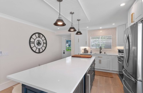 Royal Harbor Condo | RENOVATED 2 Bed, 2 Bath 1st floor with heated pool on the bay!