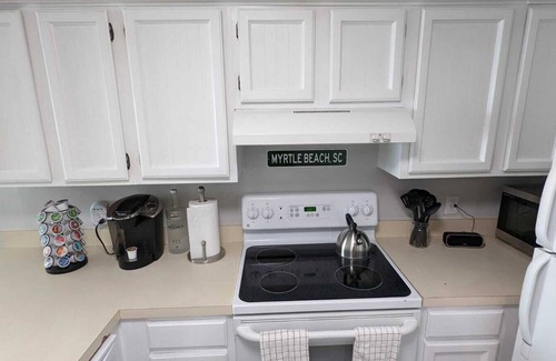 Windy Hill Condo | Renovated 2 bedroom ocean front condo - Right on the beach!
