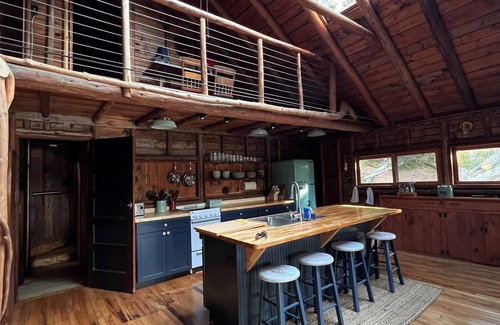 West Point Cabin | Renovated 3-BR boathouse built atop water in quiet cove; private float & trails