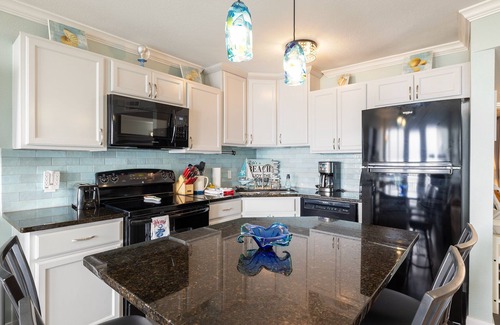Galveston Condo | RENOVATED BEACHSIDE Condo-Elevator-Heated Pool-in unit Washer/Dryer