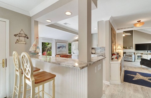 Lawton Woods House | Renovated coastal Sea Pines beach home with a private pool