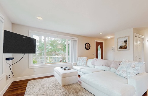 Clinton House | Renovated home in a forest glen with fantastic deck & fireplace - walk to beach