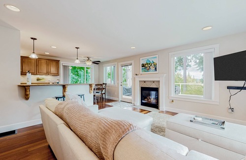 Clinton House | Renovated home in a forest glen with fantastic deck & fireplace - walk to beach