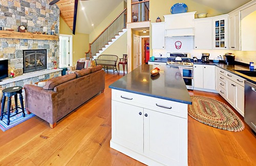 Lamoine Beach Cottage | Renovated waterfront cottage with expansive deck, multiple fireplaces, & grill