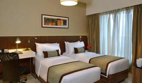 Malad West Hotel | Residency Sarovar Portico