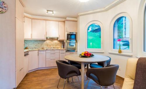Leukerbad Apartment | Residenz Ambassador B13 mit Wellness-Fitness