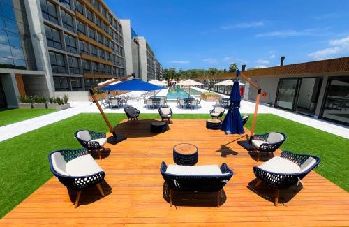 Xangri-La Apartment | Resort com Piscina Aquecida e Garagem em Xangri-lá