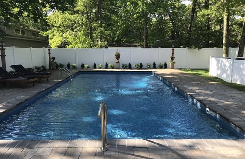 East Quogue House | Resort Style Backyard/Chalet all Newly Renovated/Heated Private pool