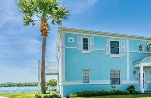 Coquina Key Condo | Resort style Luxury condo on the waterfront with private patio overlooking bay.