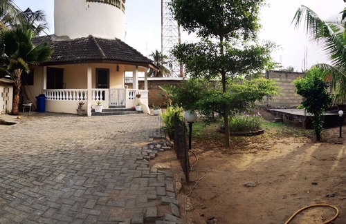 Teshie House | RestAwhile A charming Roundhouse with own garden near the beach