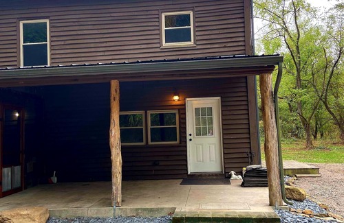 Langsville House | Restored 100-year-old Barn House in Private Forest. Perfect for gatherings.