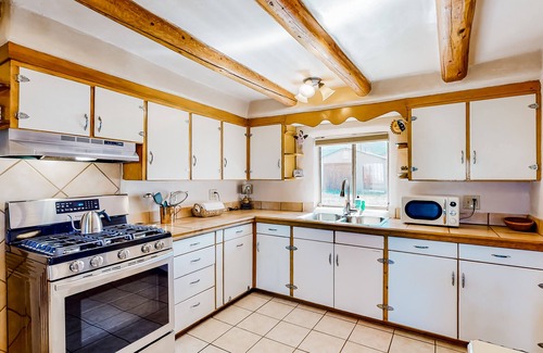 Taos House | Restored 1938 adobe with mountain view & kiva fireplace - dog-friendly