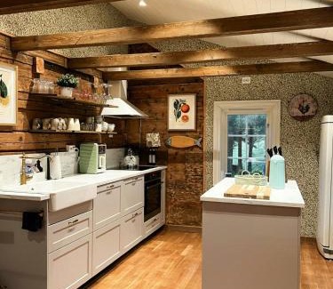 Vagsoy House | Restored Farmhouse By The Sea In Kvalheim