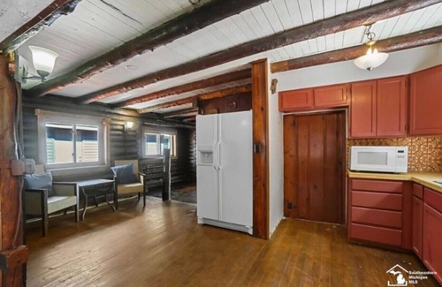 Ida Cabin | Restored historic log cabin and deck on Lake Erie
