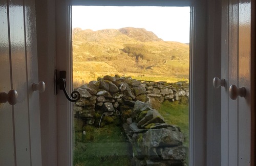 Manod Cottage | Restored Welsh cottage, pet friendly, wood burning stove, walks from the door.