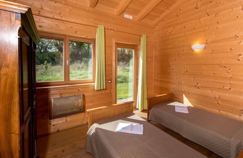 Ponte d'Assi Cabin | Retino Wood House - wooden cottage with veranda - green energy