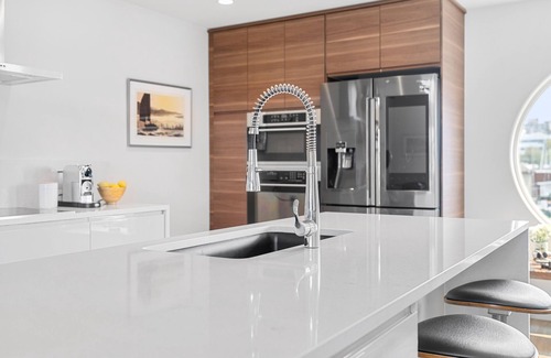 Lower Lonsdale Boat Rental | Retreat to "The Sea Haven" for comfort & style! Stay in an elegant floating home