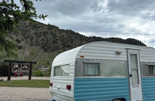 Lava Hot Springs House | Retro Camper Queen size bed